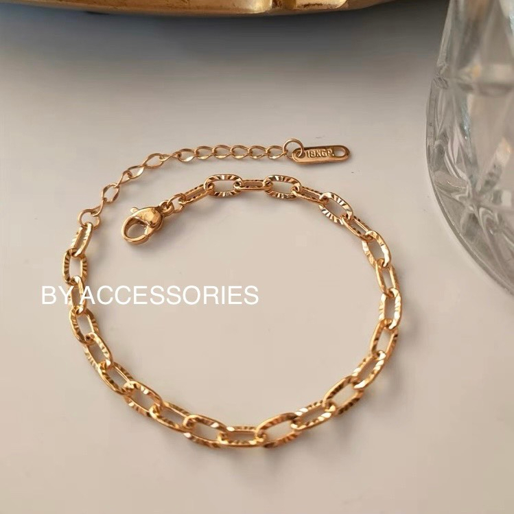 Lắc tay nữ titan xích nhỏ dập cạnh phản xạ ánh sáng mạ vàng 18K thời trang không gỉ WB2309