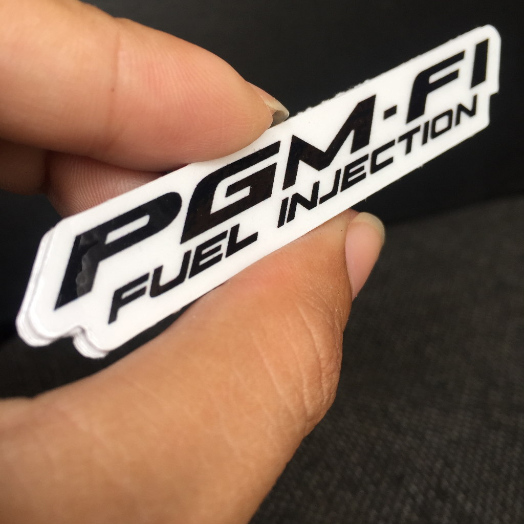Bộ 2 Tem chữ PGM FI chữ đen nền trong suốt. Decal dán mọi dòng xe Honda phun xăng điện tử. Cực kì sắc nét, chống nước
