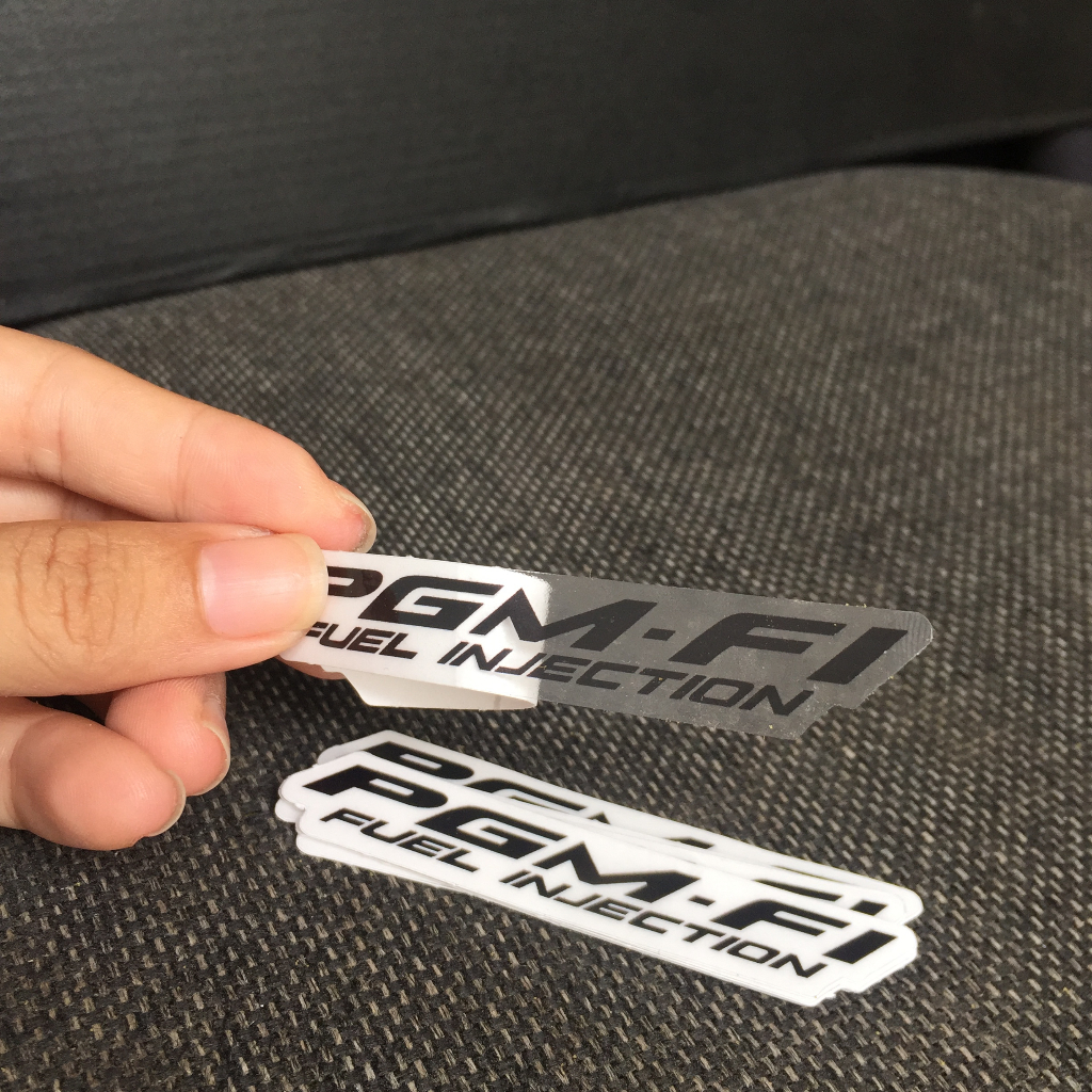 Bộ 2 Tem chữ PGM FI chữ đen nền trong suốt. Decal dán mọi dòng xe Honda phun xăng điện tử. Cực kì sắc nét, chống nước