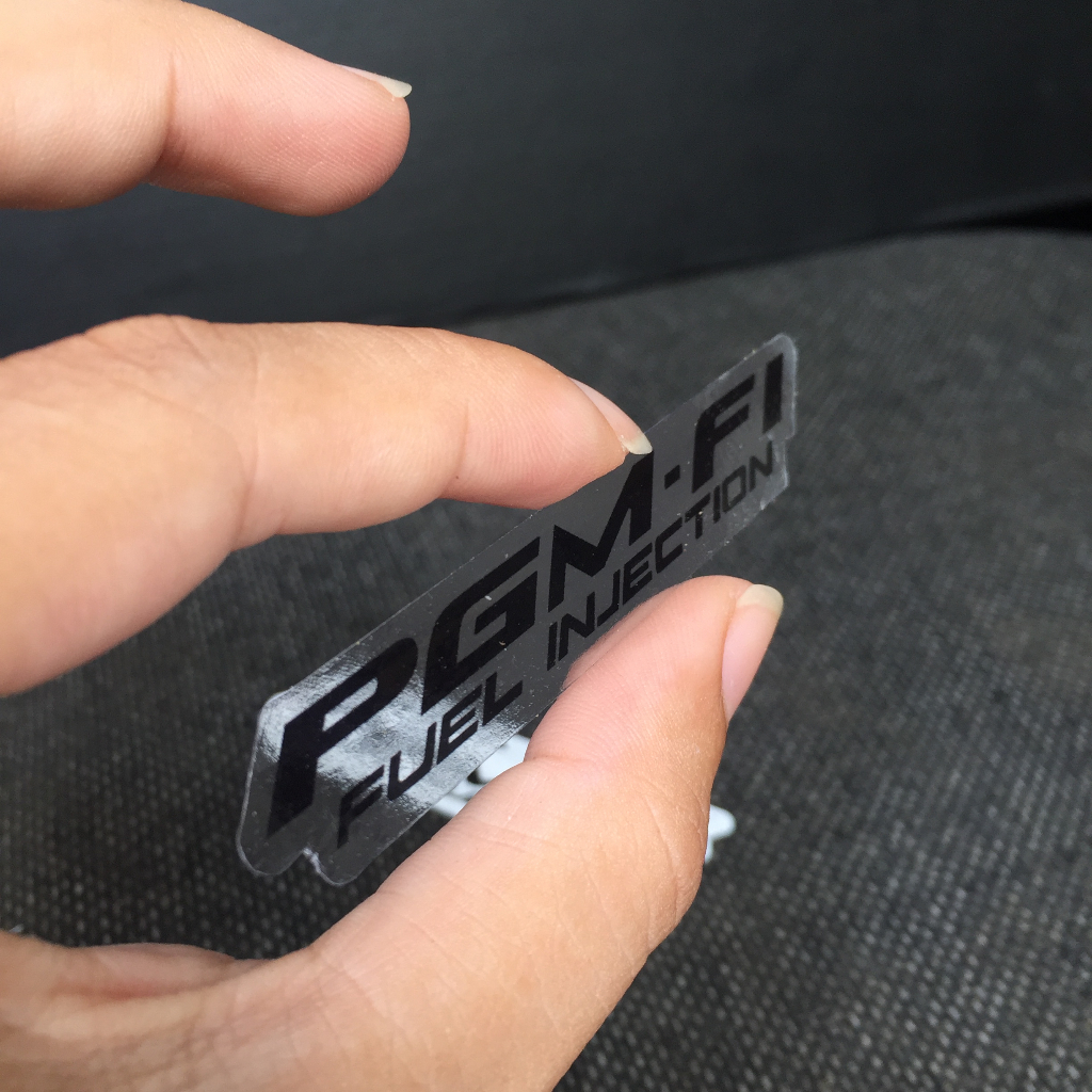Bộ 2 Tem chữ PGM FI chữ đen nền trong suốt. Decal dán mọi dòng xe Honda phun xăng điện tử. Cực kì sắc nét, chống nước