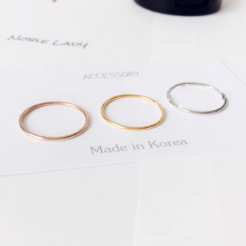 Nhẫn nữ titan mảnh basic dạng cong bo tròn không gỉ