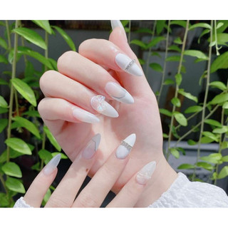 móng tay giả thiết kế thủ công đính nơ nhẹ nhàng