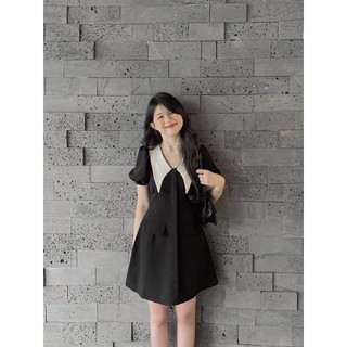 Váy đầm đen cổ chéo trắng