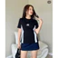 Áo thun baby tee nữ phối trắng đen. Chất vải cotton co giãn phối viền họa tiết chữ M