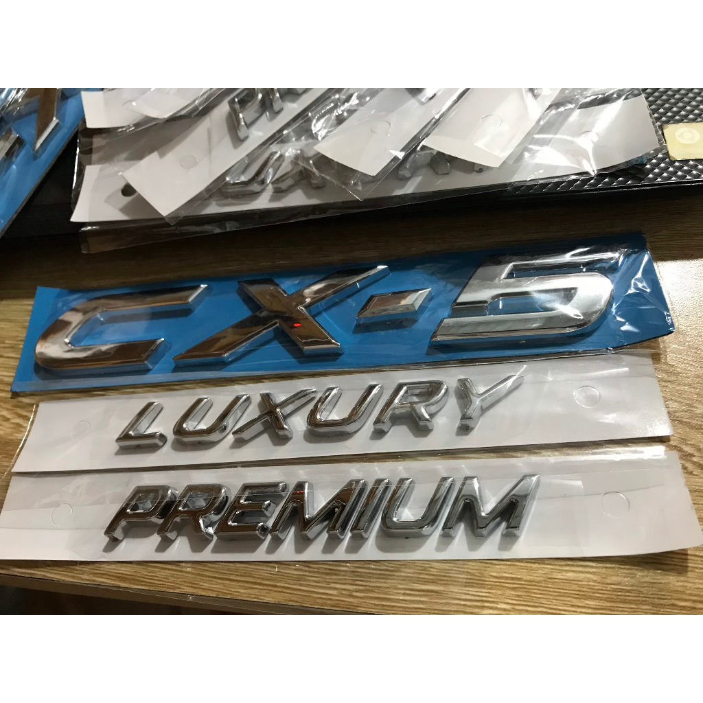 Chữ ( logo ) Premium / Luxury / CX-5 dán đuôi xe Kia Cerato, Seltos, K3 ...