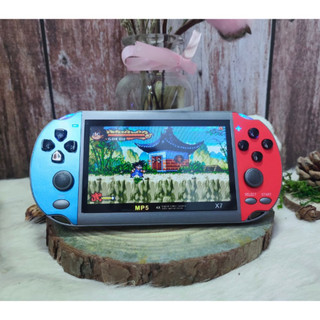 Máy chơi game cầm tay X7 kèm thẻ nhớ 8G gồm 900 trò, màn hình 4.3 inch , nghe nhạc, xem phim, đọc sách