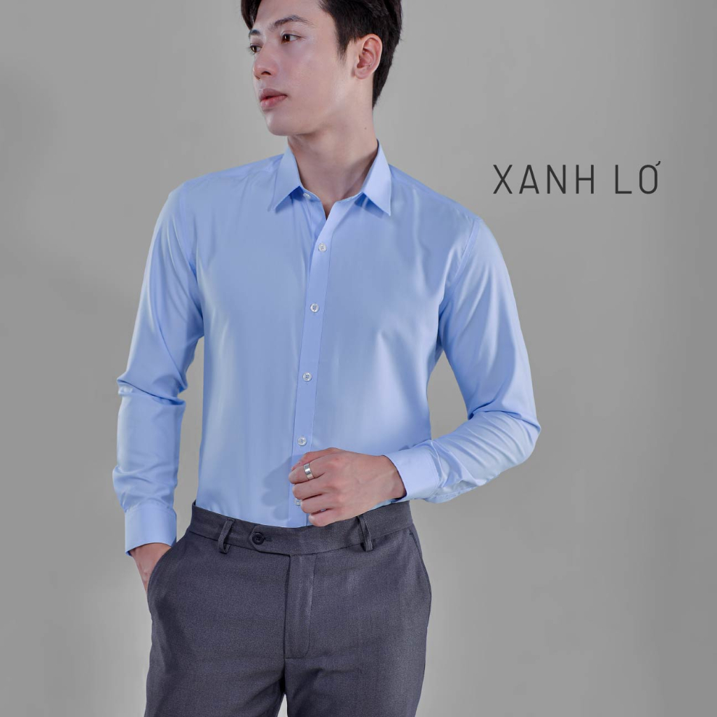 Áo sơ mi nam trắng dài tay HTSM MAGNOR vải trơn, vải Polyspun chống nhăn, cổ bẻ, dáng slimfit công sở không túi ngực