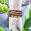 Vòng trầm tốc thường 108 hạt 6ly mix charm túi tiền và cỏ 4 lá ,giành cho nữ,thanh lịch dễ thương.