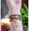 Vòng trầm tốc thường 108 hạt 6ly mix charm túi tiền và cỏ 4 lá ,giành cho nữ,thanh lịch dễ thương.