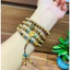 Vòng tay bằng trầm hương tóc lào, mix charm tổng hơp đá xanh hoa sen mix vàn:g 24k-An yên-Thanh lịch-May mắn