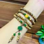 Vòng tay bằng trầm hương tóc lào, mix charm tổng hơp đá xanh hoa sen mix vàn:g 24k-An yên-Thanh lịch-May mắn