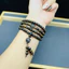 Trầm hương sánh chìm vòng tay/chuỗi tràng hạt 6li 108 hạt mix charm đá thạch anh, đẹp, thơm và phong cách.