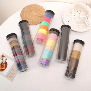 Hộp 20 Dây Cột Tóc Hàn Quốc July Cao Su Co Giãn Tốt, Nhiều Màu, Hộp Trong Suốt Sang Trọng