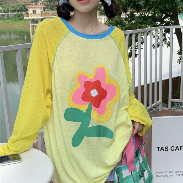 (sẵn)Áo dài tay mỏng thun giấy form rộng hoạ tiết bông hoa màu sắc dễ thương chất vàng hồng ATDT005 - Tiktik