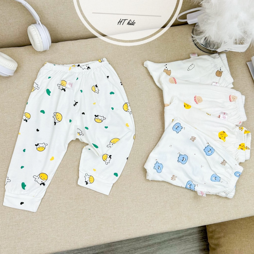 Quần dài chục đáp đũng cho bé trai bé gái chất thun lạnh nền trắng họa tiết thú đáng yêu 4-14kg mesocshop
