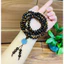 Vòng tay bằng trầm hương sánh chìm 6ly 108 hạt mix charm hoa mẫu đơn đá Aqua.