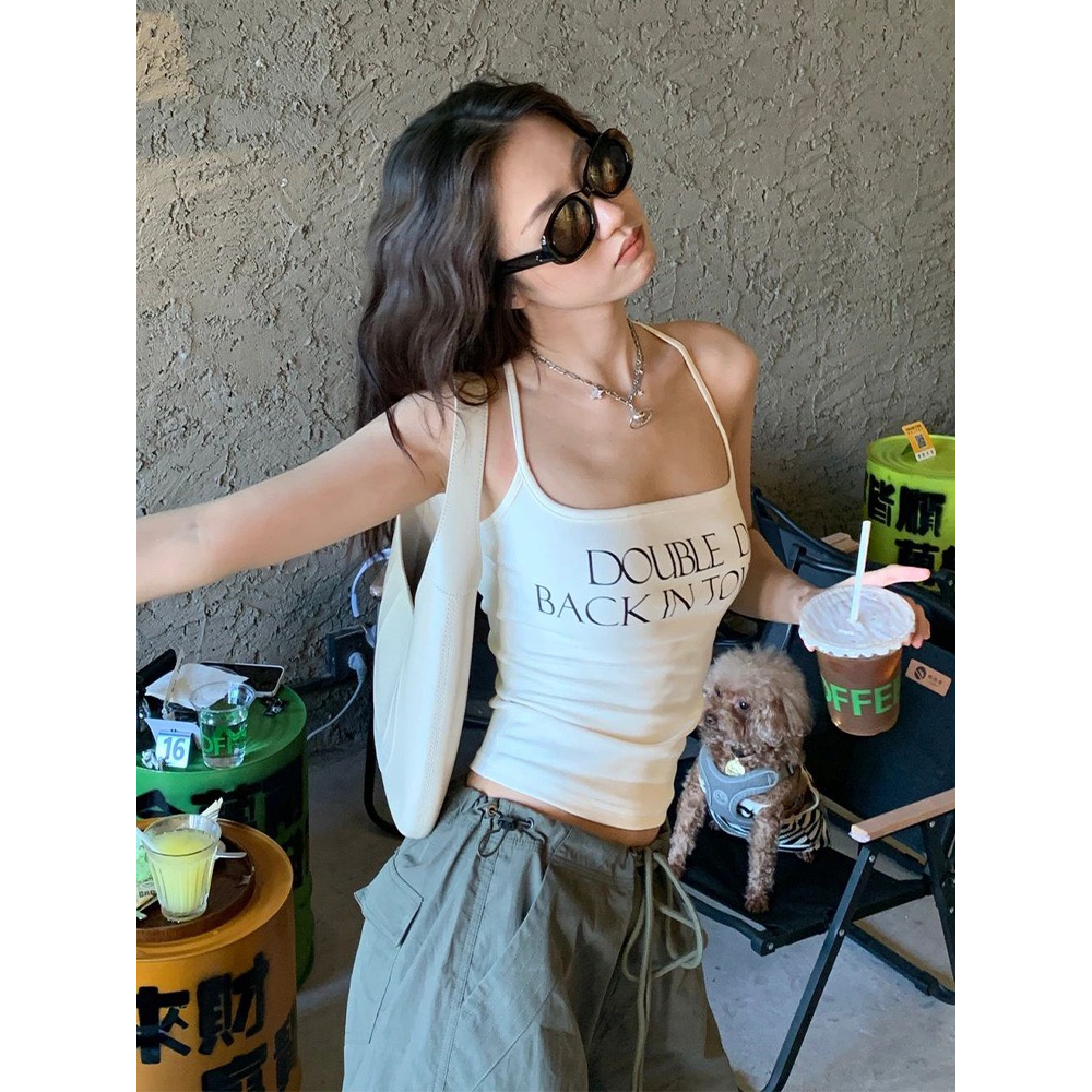 Áo croptop 2 dây cổ yếm đan chéo sau hở lưng hoạ tiết chữ chất thun cotton co giãn thoáng mát màu be AHDY001