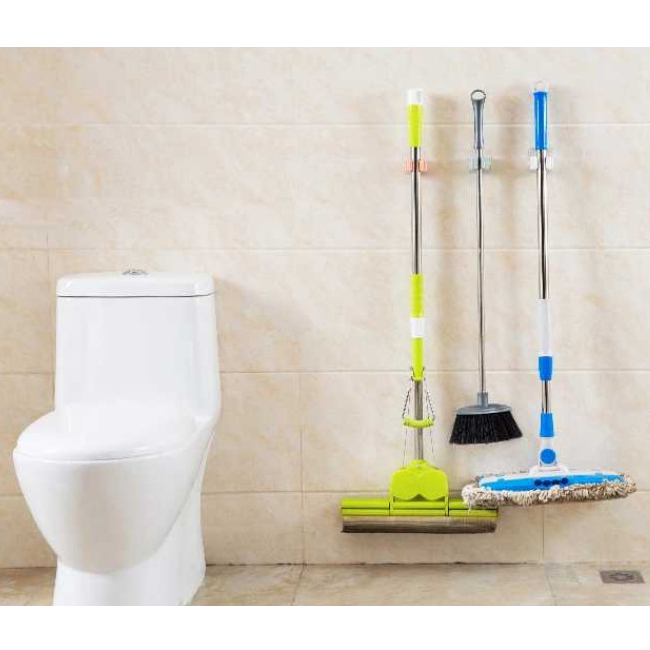 Móc treo chổi dán tường không cần đóng đinh đục lỗ