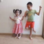 Váy 2 Dây Nơ To Màu Hồng Cam Đầm Xòe Qua Gối Cho Bé 4-5 Tuổi 17-20kg