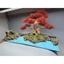 Tiểu cảnh dành cho bể cá cảnh kích thước 40 cm trở lên. Cây Bonsai tán Tùng kết hợp với sỏi, đá, cát, dán trên Tấm Alu