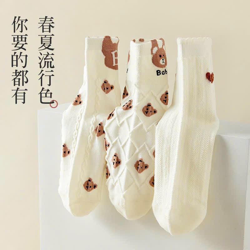 TÚI 10 ĐÔI TẤT GẤU TRẮNG CHỮ B CỔ CAO TT25