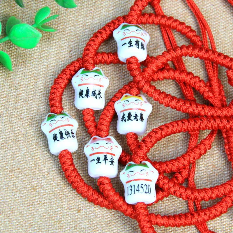 Vòng tay Mèo Thần Tài Maneki Neko May Mắn Bình An chỉ đỏ
