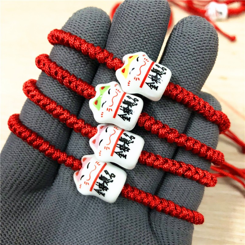 Vòng tay Mèo Thần Tài Maneki Neko May Mắn Bình An chỉ đỏ