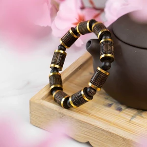 Vòng tay trầm hương nam bằng sánh chìm kiểu trúc đoạn 12 li bọc 10k-Tài lộc hanh thông bình an.