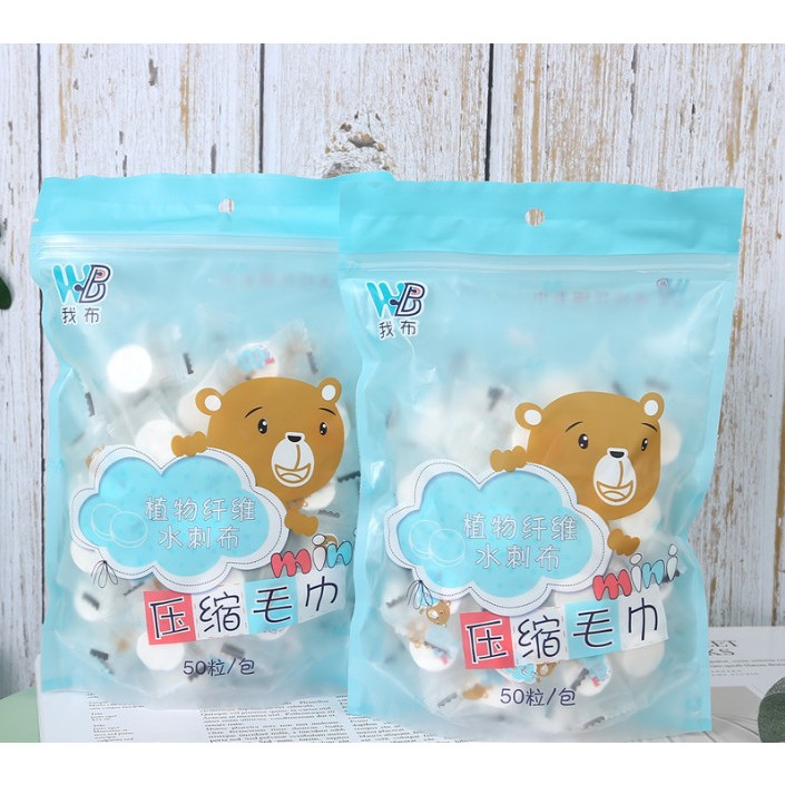 Túi 50 viên Khăn giấy nén dạng viên kẹo hình gấu xanh 25 x 23cm