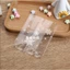 Combo 100 Túi đựng trà bánh 7x10cm trắng trong họa tiết BÔNG TUYẾT nhiều kích thước- Phukientuiloc