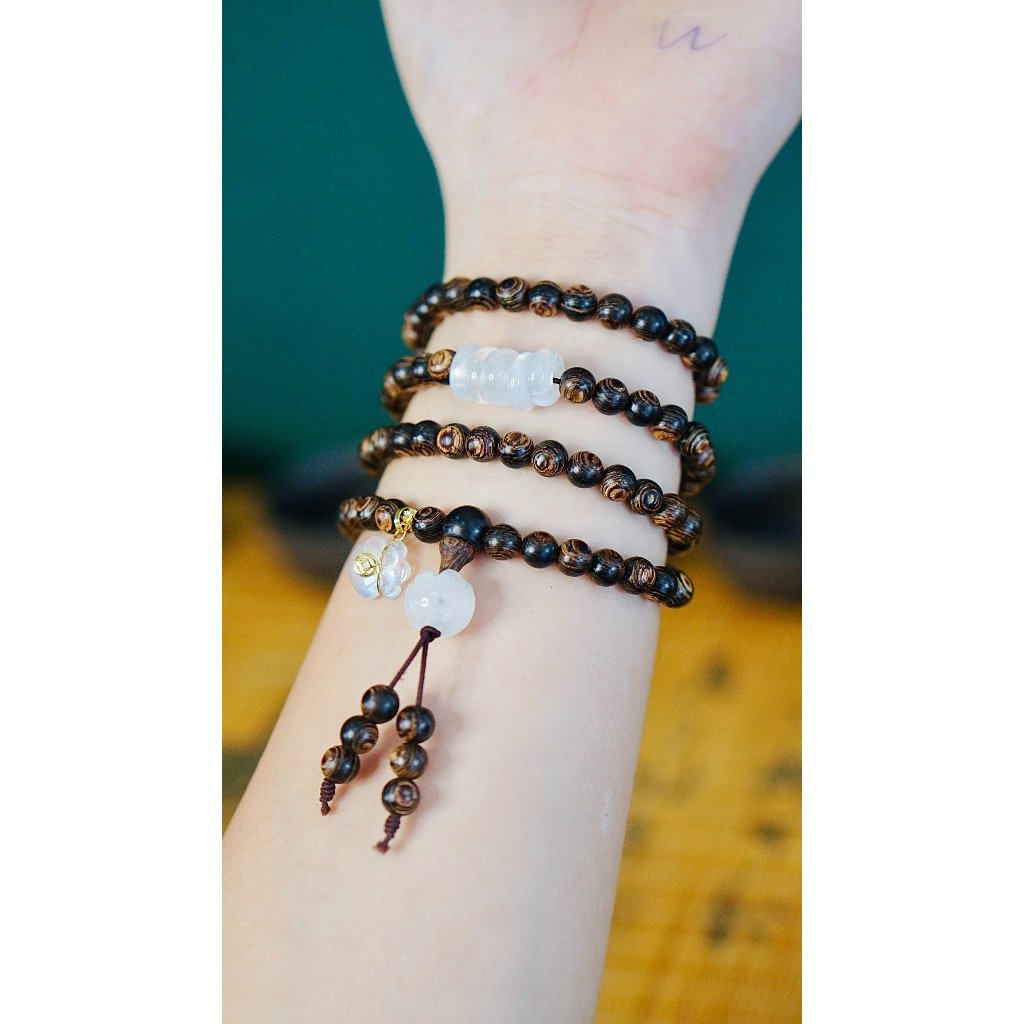 Chuỗi trầm hương sánh chìm 6ly 108 hạt mix ngũ điếu màu trắng và túi tiền 10 ka-Trầm hương Hội an.