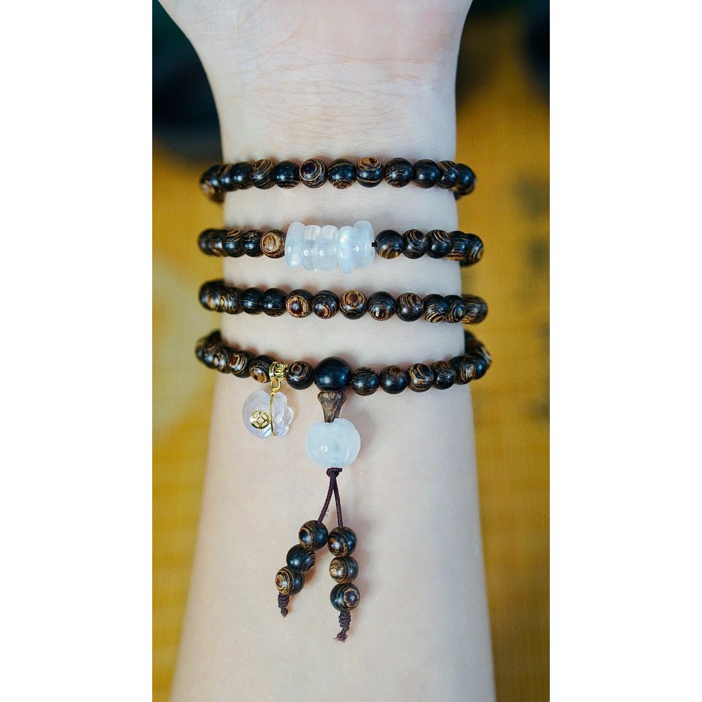 Chuỗi trầm hương sánh chìm 6ly 108 hạt mix ngũ điếu màu trắng và túi tiền 10 ka-Trầm hương Hội an.