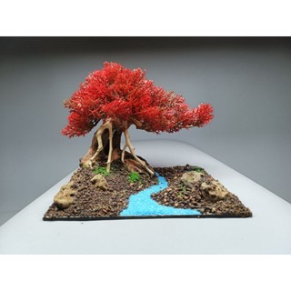 Cây gỗ Lũa Bonsai kết hợp với Dòng Suối dành cho bể cá 30 đến 45 cm. Tán Tùng có nhiều màu. Đế đá