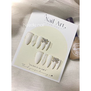 Nail box thiết kế đính charm nơ màu trắng xinh.needle nail