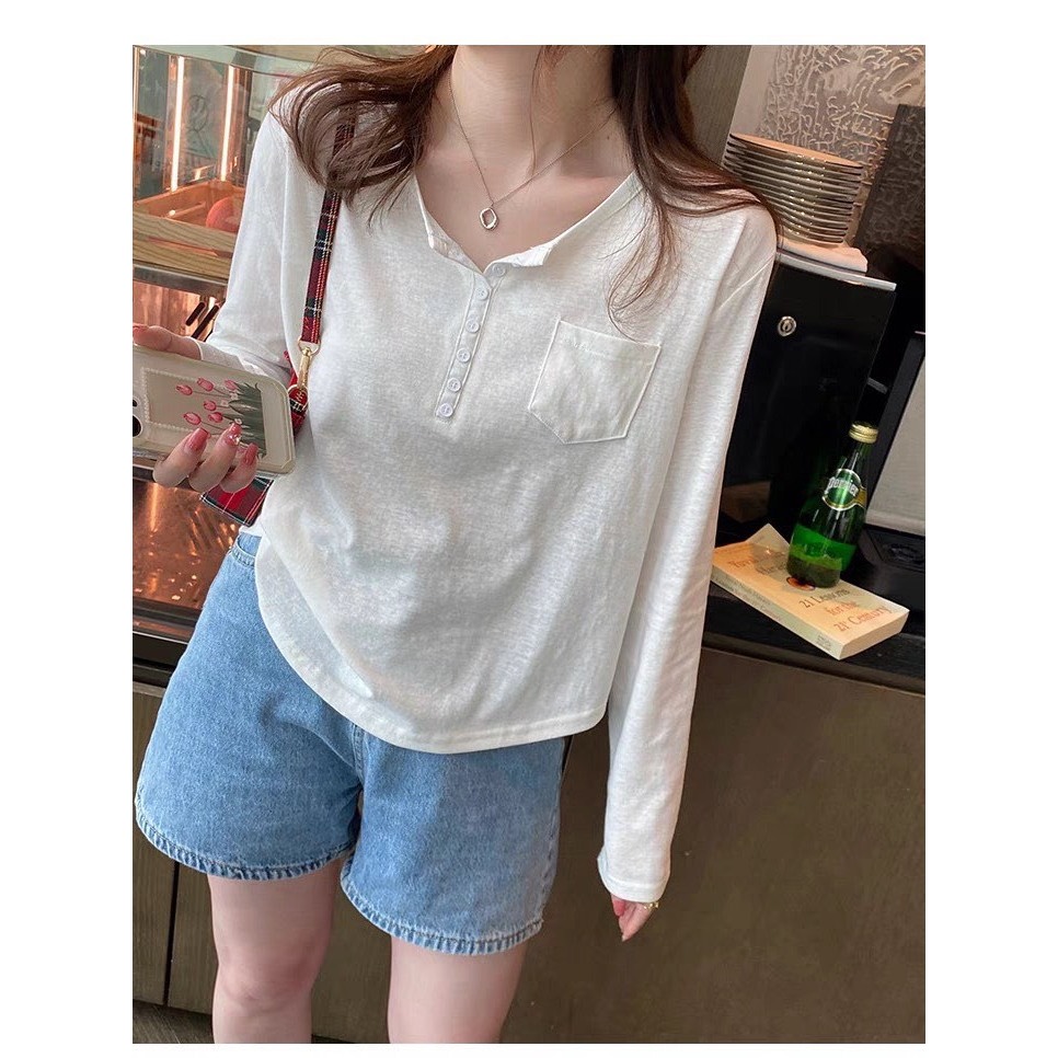 Áo thun nữ dài tay cổ tròn xẻ trụ nút JULY, Áo dài tay nữ Chất xược phom lửng, lai bầu phối nút màu pastel