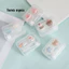 Khay gắn thú hộp vuông kèm dụng cụ đeo lens