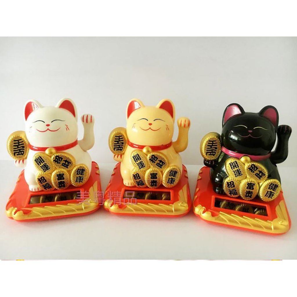 Mèo Thần Tài Vẫy Tay