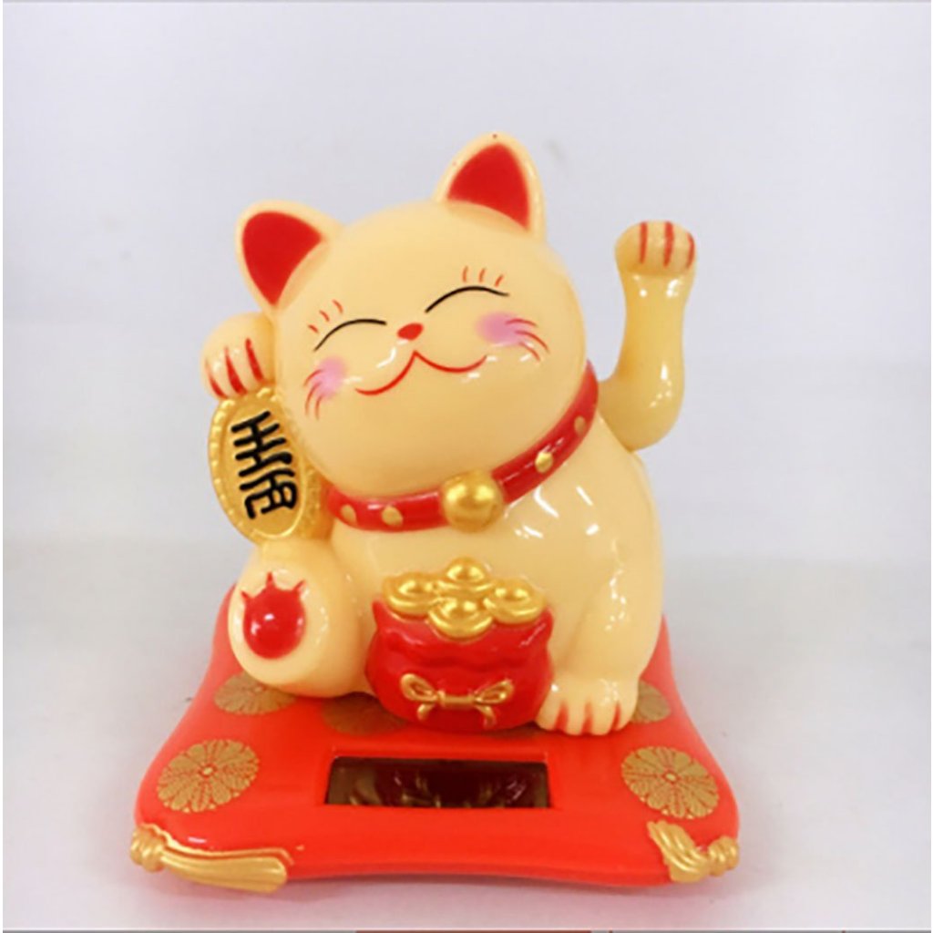 Mèo Thần Tài Vẫy Tay