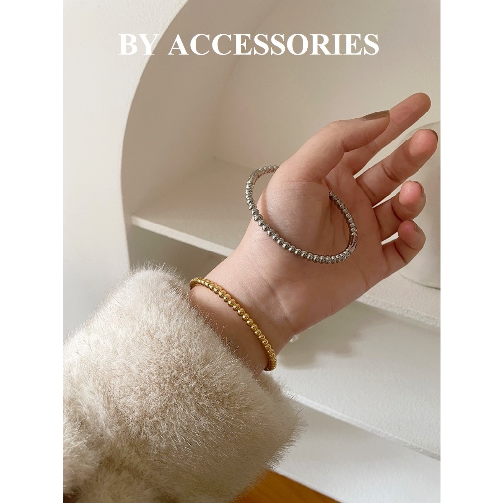 Vòng tay nữ unisex titan bi tròn có khóa mở không gỉ CF13 BY ACCESSORIES