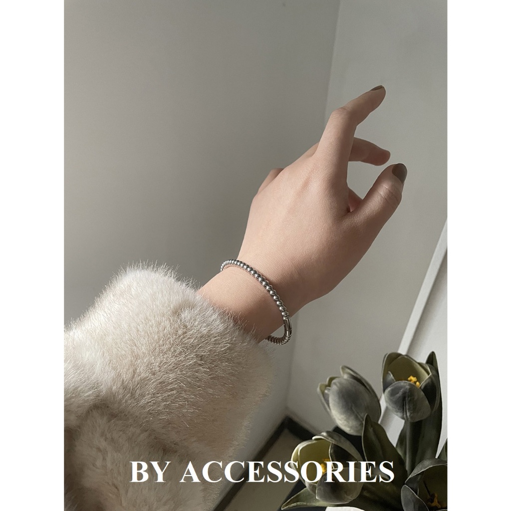 Vòng tay nữ unisex titan bi tròn có khóa mở không gỉ CF13 BY ACCESSORIES