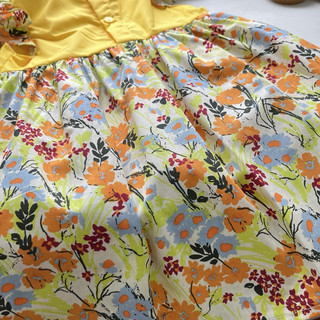 Váy bé gái 1-6 tuổi (9-26kg) sát nách cánh tiên hoa vàng nổi bật N0098