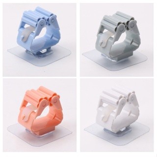Móc treo chổi chịu lực siêu chắc chắn dán tường kẹp giữ cây lau nhà siêu chắc chắn, tiện lợi.
