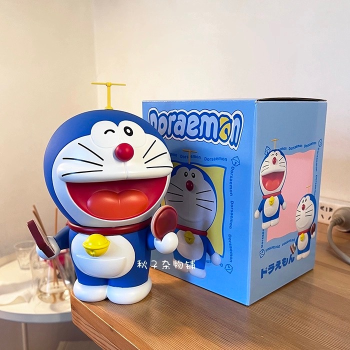Mô hình Doraemon có khớp nằm ngủ / cầm bánh rán 23cm ( hàng có hộp xinh ...