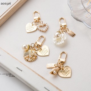 Móc khóa charm treo túi hình trái tim đính ngọc trai phụ kiện thời trang cho nữ quà tặng handmade