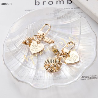 Móc khóa charm treo túi hình trái tim đính ngọc trai phụ kiện thời trang cho nữ quà tặng handmade