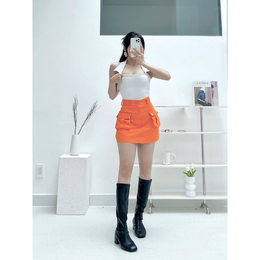 Chân váy chữ A Nữ chất vải kaki có lót trong.