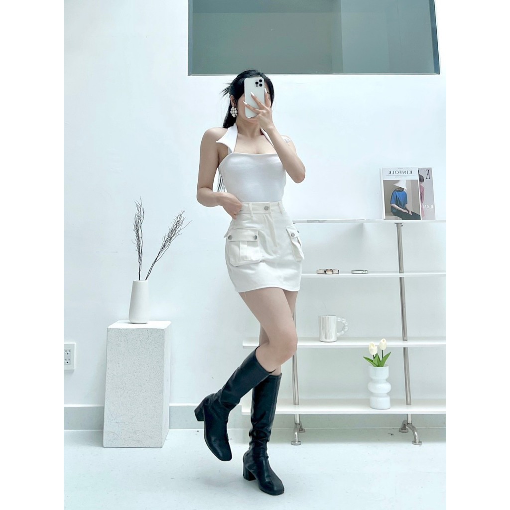 Chân váy chữ A Nữ chất vải kaki có lót trong.