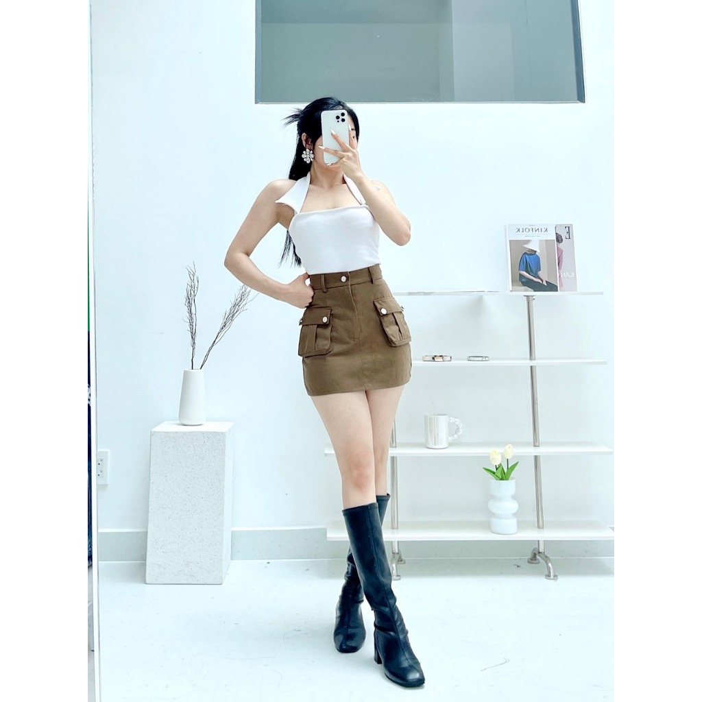Chân váy chữ A Nữ chất vải kaki có lót trong.