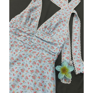 Lucy Dress - Đầm yếm cột nơ hở lưng hoạ tiết hoa nhí.