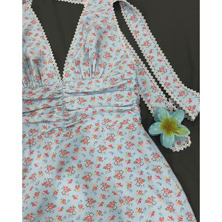 Lucy Dress - Đầm yếm cột nơ hở lưng hoạ tiết hoa nhí.